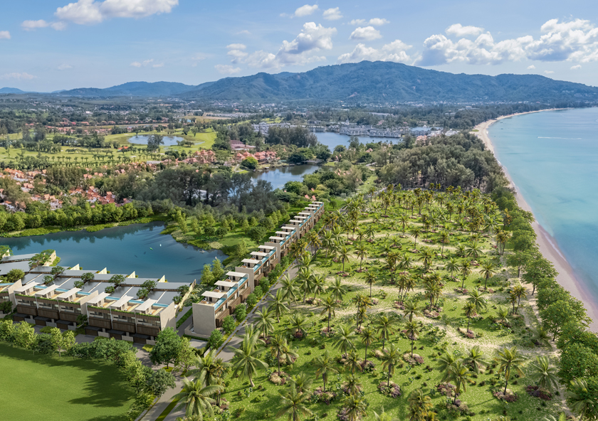 Banyan Tree Grand Residences Beach Terraces | An elegant terrace with modern furniture basks in the warm glow of a sunset, overlooking a tranquil sea and lush greenery.